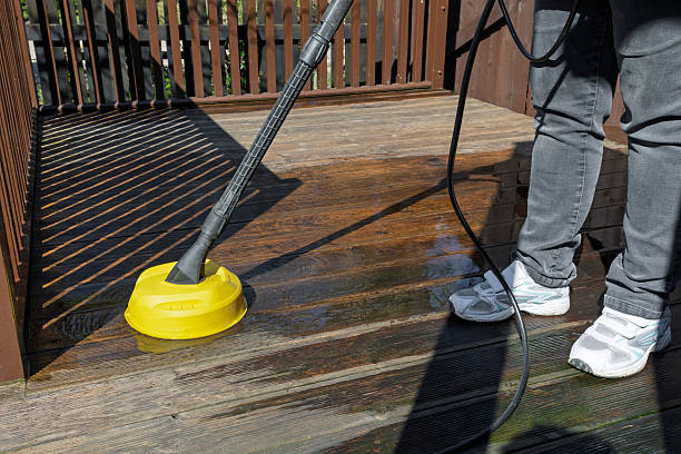 istock Cleaning Wooden Deck with Power Washer 2212774469