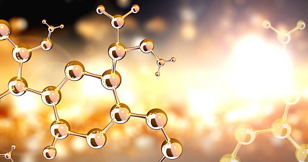 istock Vertical or horizontal banner with model of abstract molecular structure. Background is a combination of yellow and dark brown hues with a luminous glow and glass atom model. Copy space. 3d render 2212778651