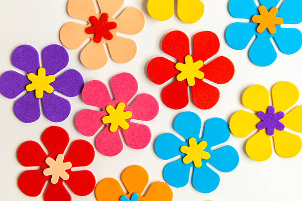 istock Colorful flower shapes arranged on a white background for creative crafting activities 2212783991