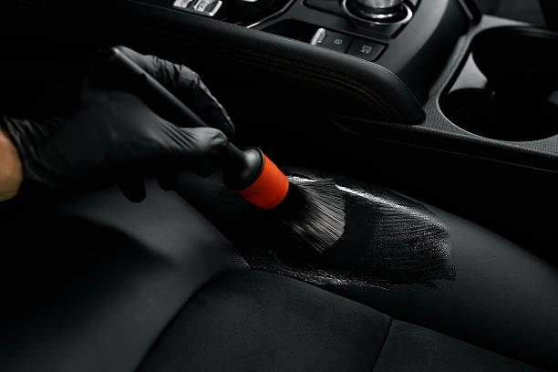 istock restoring leather seat upholstery. car interior detailing 2212785620