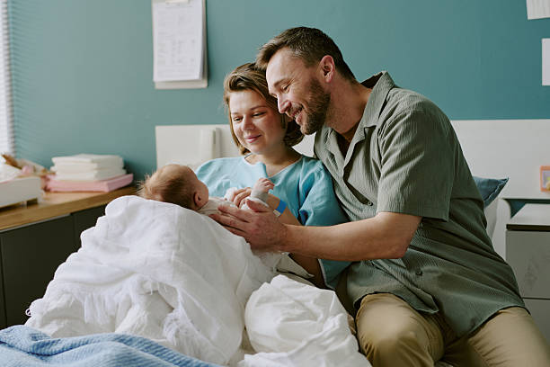 istock Bonding with Newborn Baby in Cozy Home Setting 2212786925