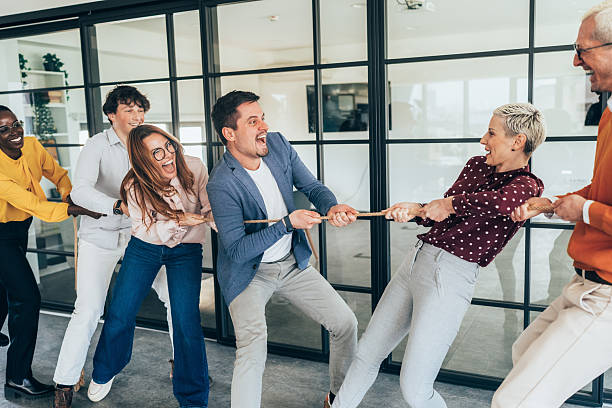 istock Office Team Tug-of-War Challenge 2212789094