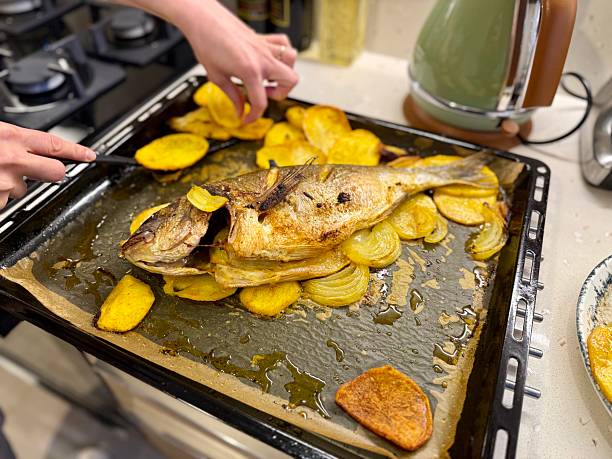 Baked Gilthead Sea Bream with Potatoes Oven Roasted Mediterranean Dish