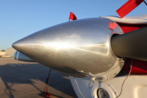 Propeller plane and Private jets side by side in airport