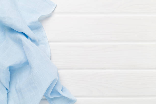 istock Cotton fabric on wooden background, top view 2212793975