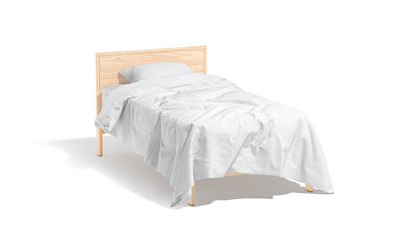 istock Blank wooden single bed with white bedding mockup, half-turned view 2212794493