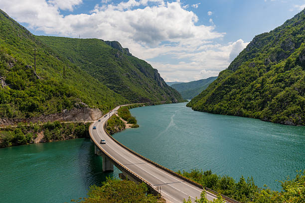 istock Scenic Road Through Canyon by Turquoise River 2212795644