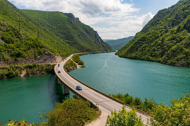 istock Scenic Road Through Canyon by Turquoise River 2212795744