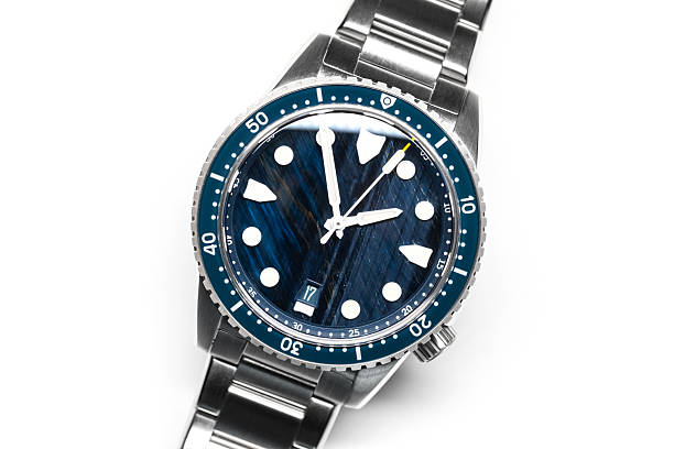 istock Stylish dive watch featuring a striking blue patterned stone dial in steel case 2212798861