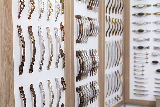 istock Samples of various furniture handles on display 2212800509