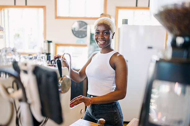 istock Cheerful Coffee Shop Owner At Work 2212802095