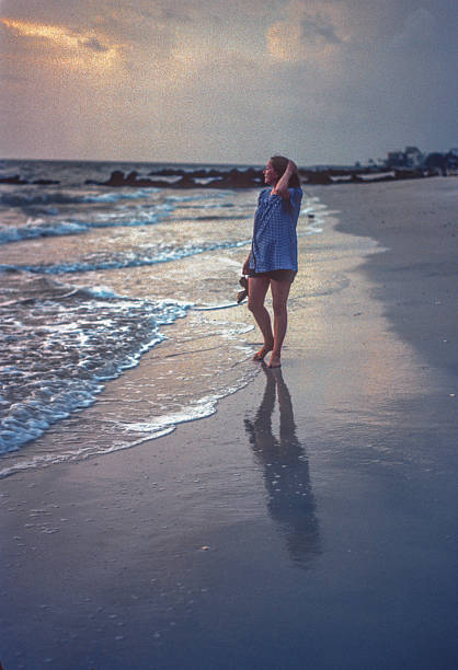 istock Naples - Mother & Daughter on Beach at Sunset - 1981 2212802114
