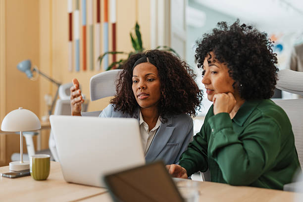 istock Ladies Engaging in Thoughtful Business Discussion 2212805830