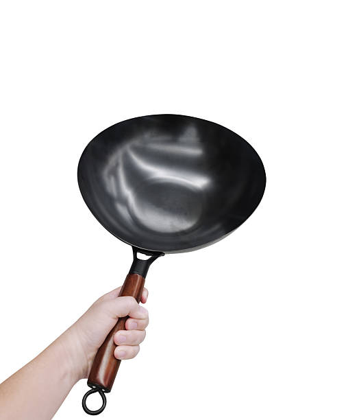 istock Image of a blank black pan handle, white background. 2212810166