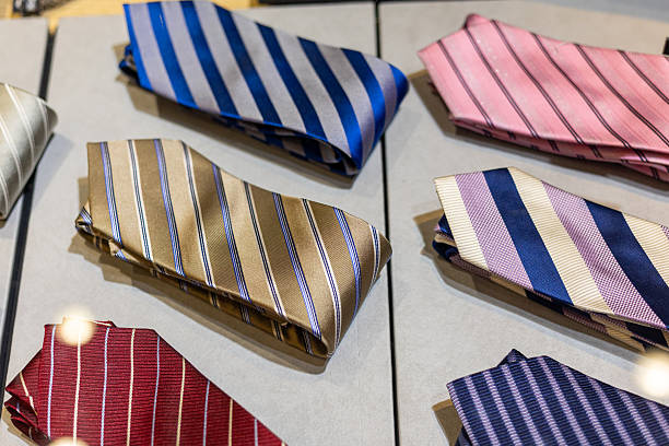 Closeup Of A Red Necktie Knot With Textured Fabric, Classic Formal Menswear Detail For Business Dress Code, Office Style, Interviews, Events, And Fashion Concepts.