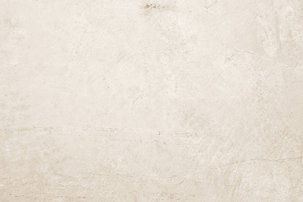 istock Colour old concrete wall texture background. Close up retro plain cream color cement wall background texture. Design paper vintage parchment element. 2212813077