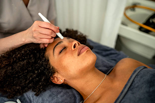 istock Relaxing Facial Treatment in Spa 2212814646