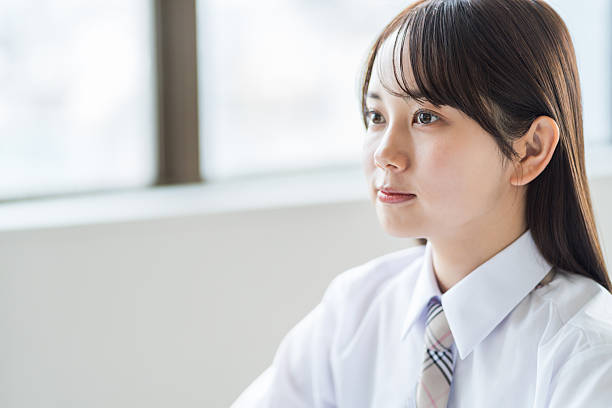 istock High school girls studying in the classroom 2212823160
