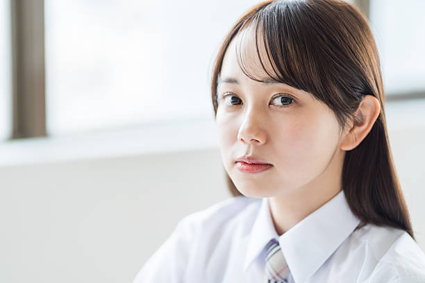 istock High school girls studying in the classroom 2212823270