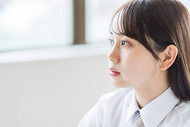 istock High school girls studying in the classroom 2212823276