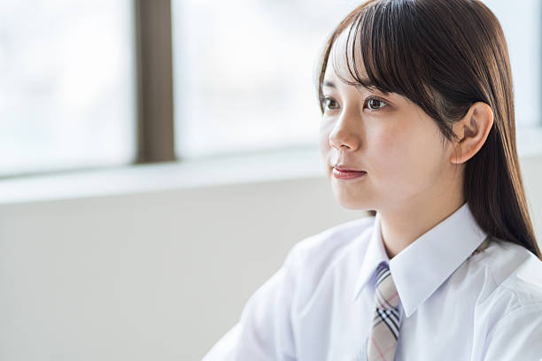 istock High school girls studying in the classroom 2212823282