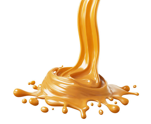 istock Caramel sauce, Liquid syrup splash, sugar candy caramel or melted toffee 2212827799