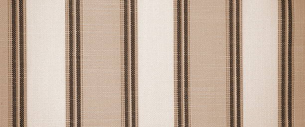 istock Fabric Striped Pattern Close-Up Sepia Textured Decorative Textile Design 2212839219
