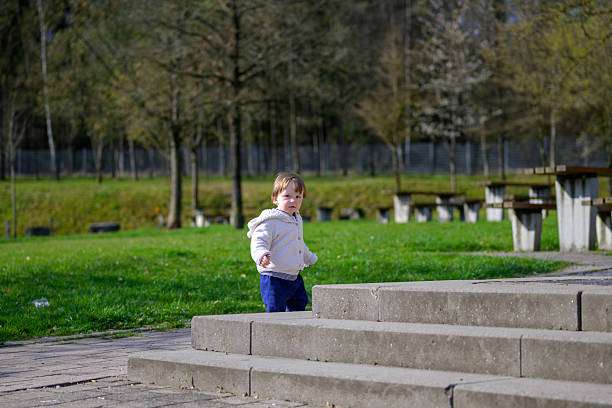 Cute little boy playing on stairs at Anitkabir, Ankara,Turkiye