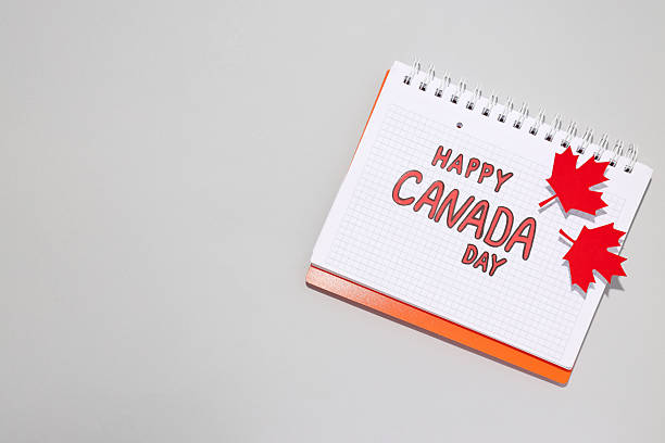 istock The inscription Happy Canada Day in a notebook 2212843087