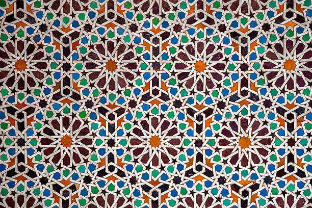 istock Colorful traditional Moroccan zellije mosaic pattern in Marrakesh, Morocco, showcasing intricate Islamic geometric art and centuries-old craftsmanship hand-cut tiles, reflecting cultural heritage. 2212843483