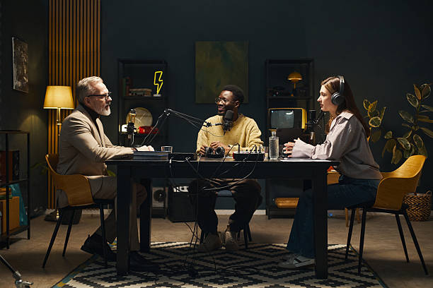 istock Young People Talking To Man During Podcast 2212855989