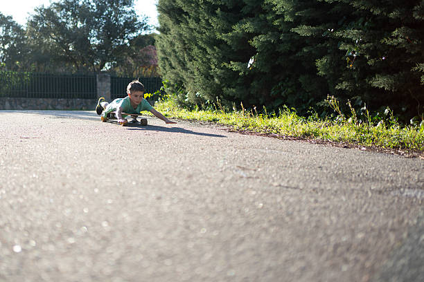 Low Section Of Person Skating At Skateboard Park