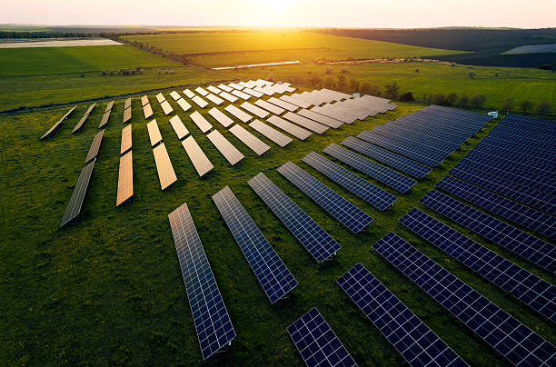 istock Alternative power source to saving environment.Solar panels park generating green energy electric at sunset.Green energy reduce carbon emissions and makes earth cleaner and more ecological. 2212867088