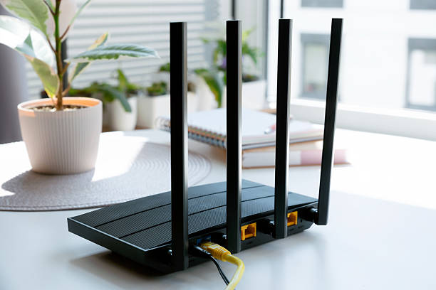 istock Router with 4 antennas in living room 2212871635