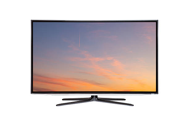 istock Flat screen TV from angled view with rural landscape with straw roll and sunset sky on screen 2212874277