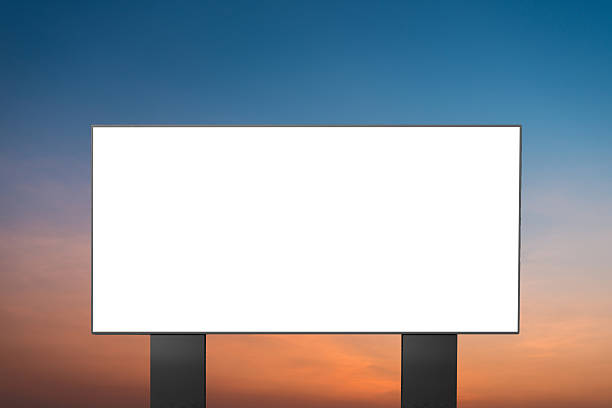 istock Billboard white blank for outdoor advertising at sunset sky. 2212874324