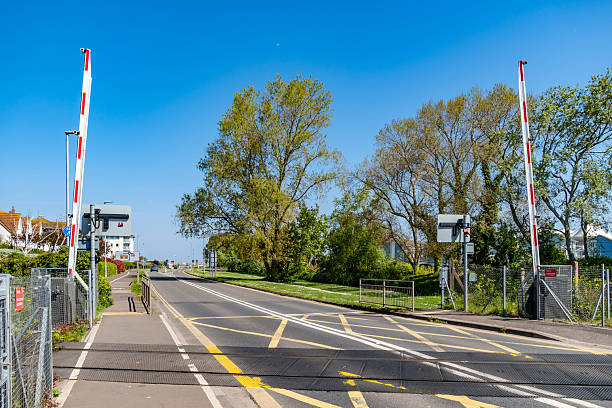 istock Train crossing road into Minehead in Somerset 2212877367