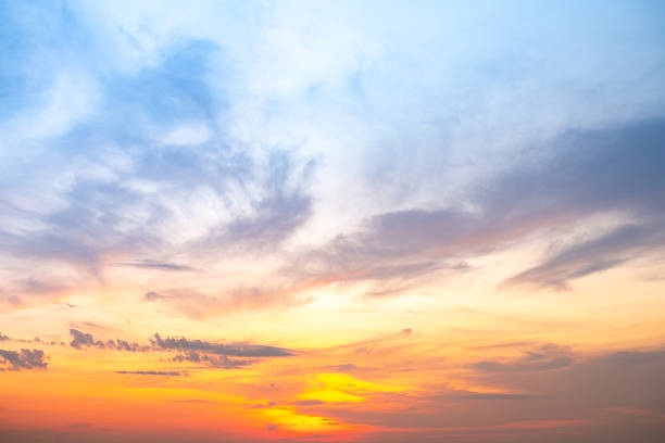 istock Beautiful , luxury soft gradient orange gold clouds and sunlight on the blue sky perfect for the background, take in evening,Twilight, Large size, high definition landscape photo 2212881112