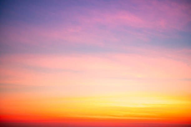 istock Beautiful , luxury soft gradient orange gold clouds and sunlight on the blue sky perfect for the background, take in evening,Twilight, Large size, high definition landscape photo 2212881192