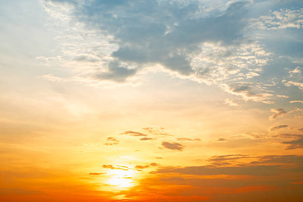 istock Beautiful , luxury soft gradient orange gold clouds and sunlight on the blue sky perfect for the background, take in evening,Twilight, Large size, high definition landscape photo 2212881315