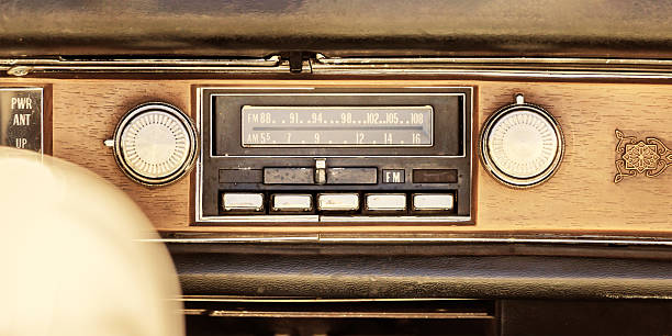 istock Old car radio inside a classic American car 2212882387