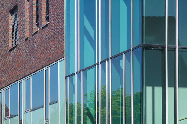 green solar panels with reflections