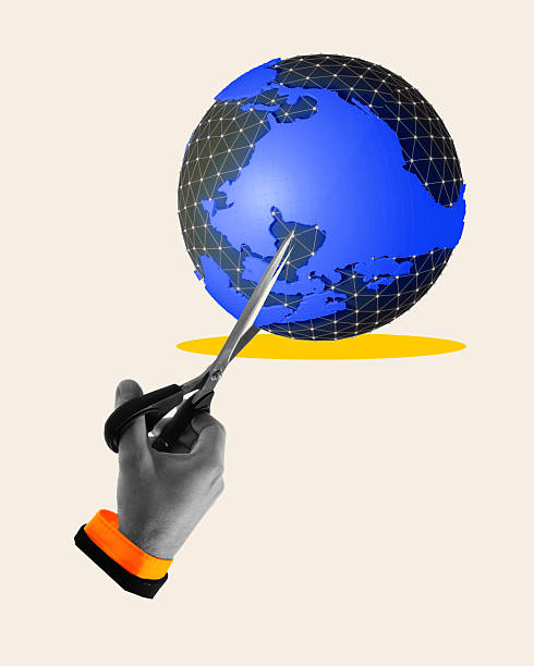 istock Composite image. Scissors approach fragile blue globe, representing threats of global trade cuts, sanctions, and economic disconnection 2212888307