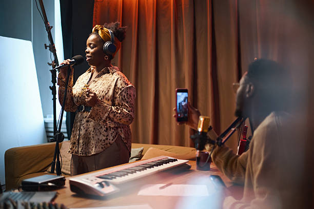 istock People Recording Song In Studio 2212891877