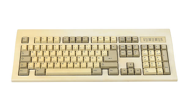 istock Vintage computer keyboard from the 1990s isolated on white background. 2212895023