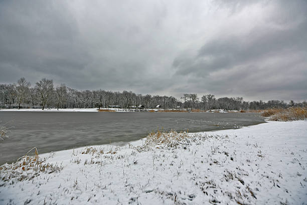 Icy, snowy landscape on the bank of the Samara River in eastern Ukraine.