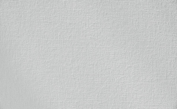 istock High resolution texture background. White primed canvas ready for painting, showcasing rough surface 2212896369