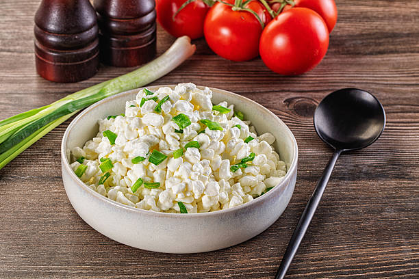 istock Cottage cheese with green onion 2212899372