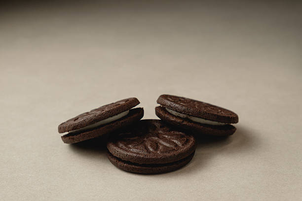 istock Delightful chocolate cookies arranged artistically on a neutral backdrop 2212900210