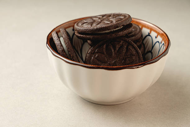 istock Delightful chocolate cookies resting in a decorative bowl 2212900293